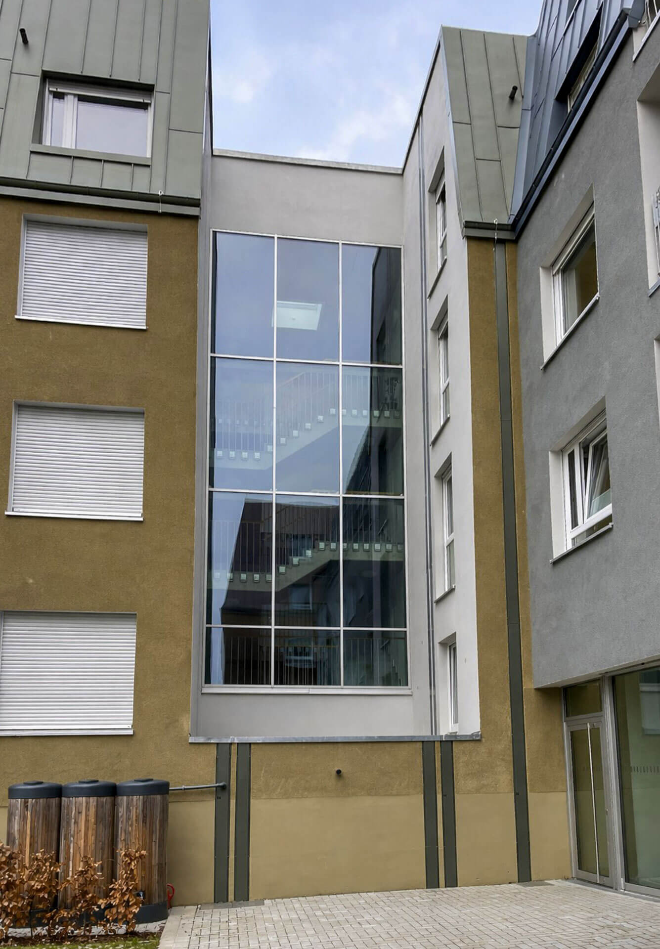 Treppenhausverglasung als Pfosten-Riegel-Fassade im Wohnquartier Alte Josefschule Münster